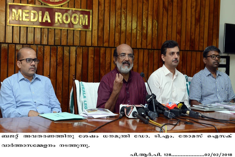 Minister Thomas Isaac at a  press meet