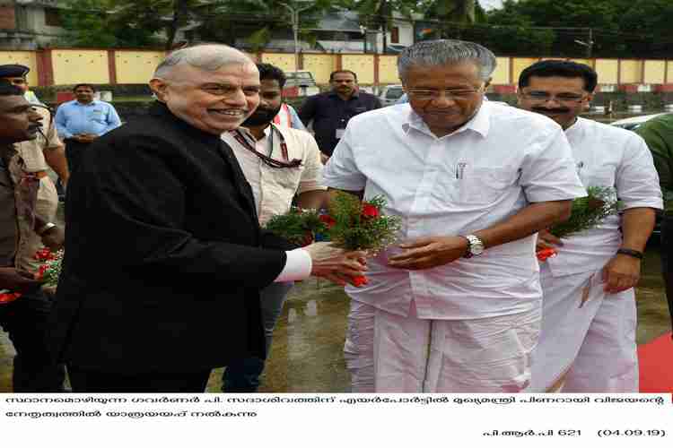 Chief Minister Pinarayi Vijayan gives sent off to P.  Sathasivam  at the airport